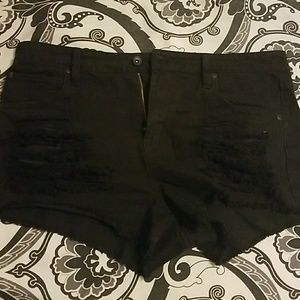 Black ripped shorts